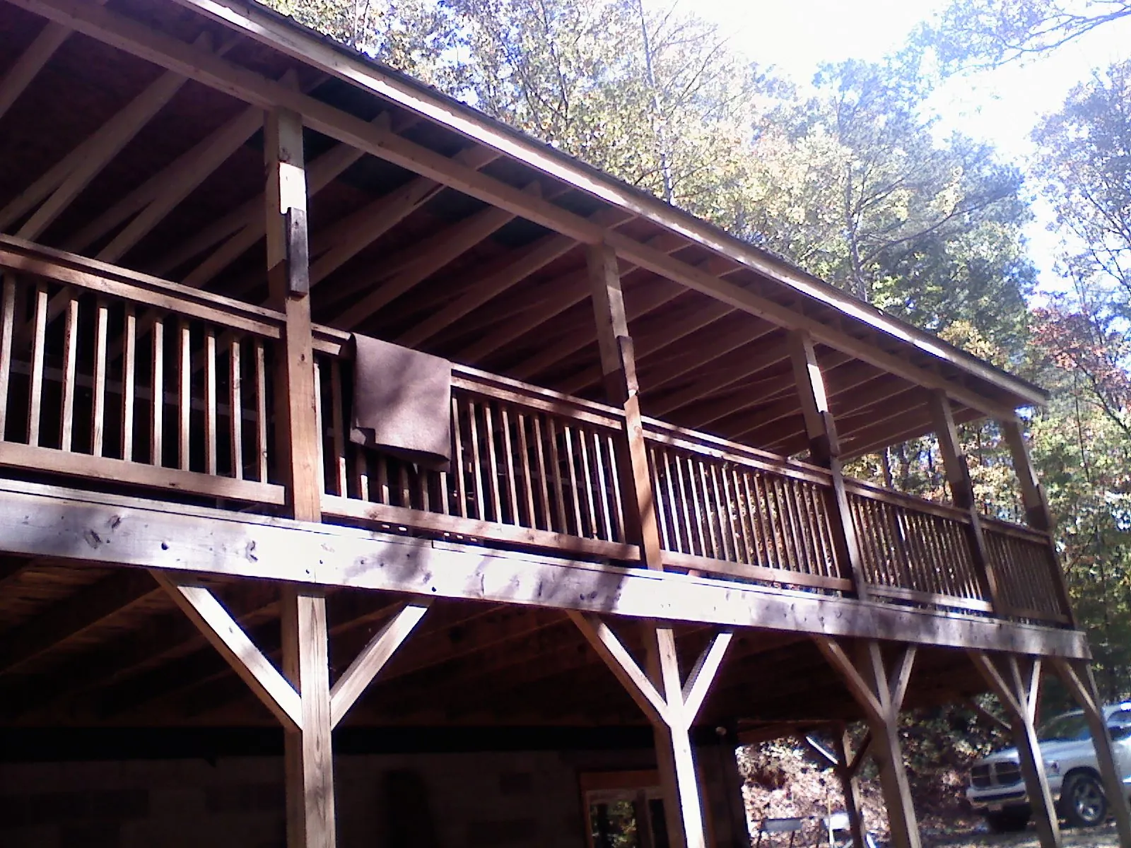 Timber framing under a new elevated porch and deck — Roof Leak Repair in Dillsboro by Roofing Brothers